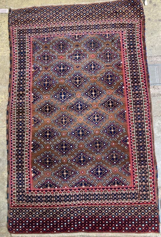 A Turkaman geometric design rug, 162 x 102cm